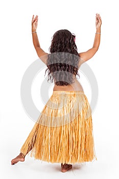 Young hula dancer seen from behind