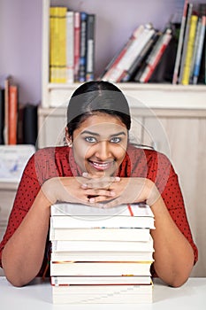Young india woman with books