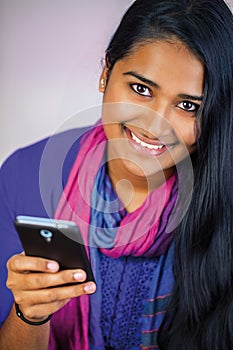 Young india woman with smartphone 2