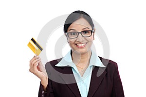 Young Indian business woman with credit card