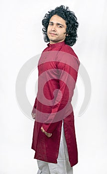 Young indian male model wearing red kurta