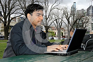 Young Indian student outside the college campus.