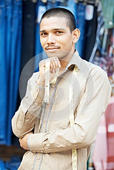 Young indian tailor man