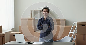 Young Indian woman, individual entrepreneur posing at workplace