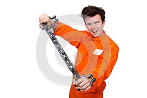 Young inmate with chains isolated