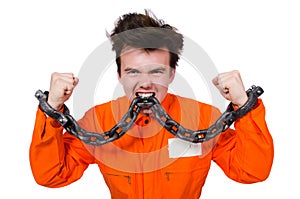 Young inmate with chains isolated