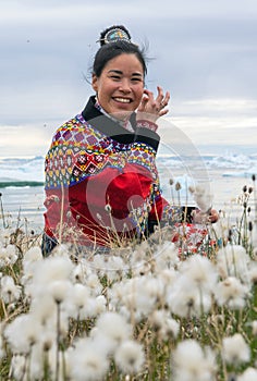 Young inuit woman in traditional clothing
