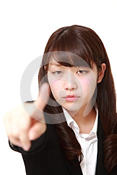 Young Japanese businesswoman scolding