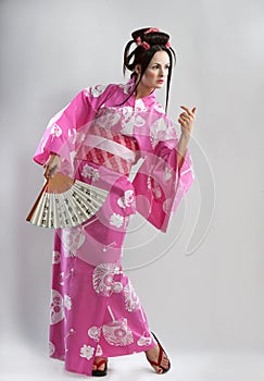 Young Japanese girl with fan