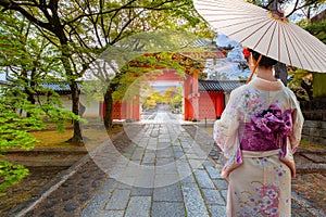 Young Japanese woman in a traditional Kimono dress at Shinnyodo temple in Kyoto, Japan