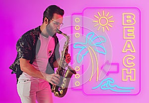 Young jazz musician playing the saxophone in neon light with neon sign