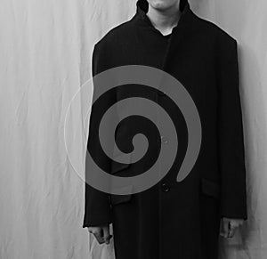 Young jewish boy with coat photo