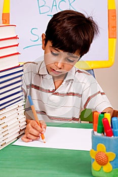 Young kid busy in drawing