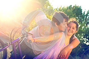 Young kids outdoors kissing