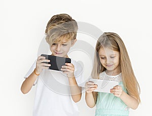 Young Kids Playing Mobile Phone