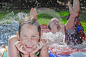 Young kids in water play