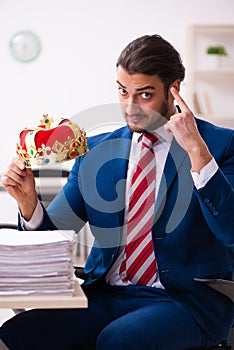 Young king businessman employee working in the office
