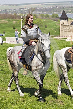 Young knight on horseback