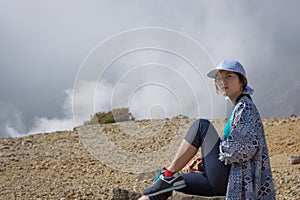 A young korean girl is enjoying the beauty of Papandayan mountain. Papandayan Mountain is one of the favorite place to hike on