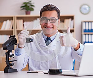 Young lab assistan working in the laboratory