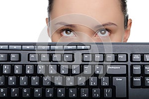 Young lady with a computer keyboard