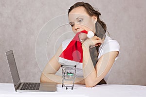 Young lady does some shopping online