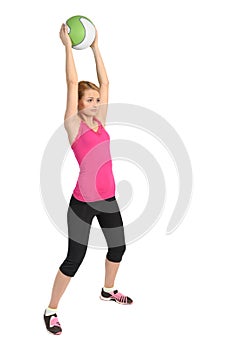 Young lady doing medicine ball workout