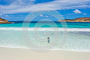 Young lady enjoying a day at Hellfire bay in Australia