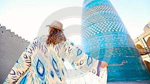 Young lady in ethnic dress in Khiva, Uzbekistan