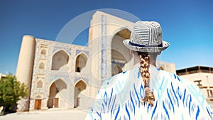 Young lady in ethnic dress in Khiva, Uzbekistan