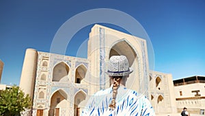 Young lady in ethnic dress in Khiva, Uzbekistan