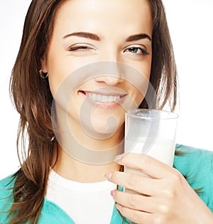 Young lady having a glass of milk