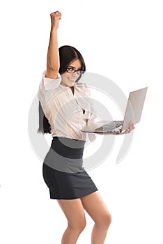Young lady with laptop and fist up