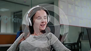 A Young Lady Listening to Music Indoors