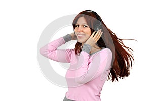 Young lady listening to music isolated