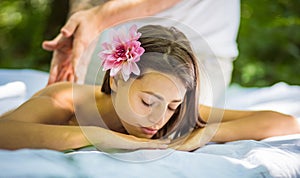 Young lady at nature enjoy in massage.