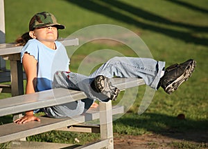 Young lady relaxing between innings