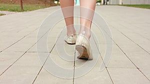 Young Lady`s Feet Walking