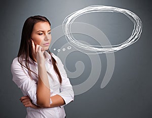 Young lady thinking about speech or thought bubble with copy spa