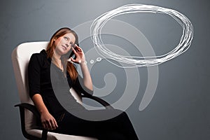 Young lady thinking about speech or thought bubble with copy spa