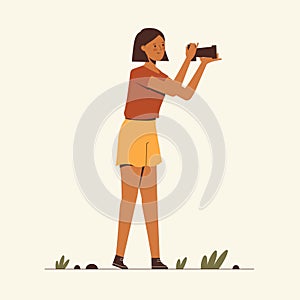 Young lady, woman with a photo camera, photographer, tourist