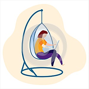 Young lady work from home with laptop hanging chair