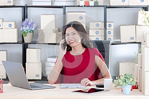 Young lady working at home office