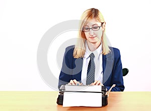 Young Lady Writing On Typewriter