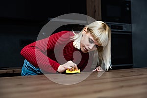 Young landlady making a big cleaning for the apartment she is renting out, to be clean for the new tenants to whom she rented out