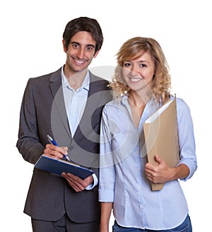 Young latin business team laughing at camera