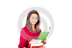 Young Latin Girl Holding stack of books and Reading