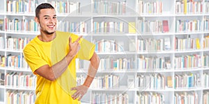 Young latin man latino showing pointing library books student people banner copyspace copy space