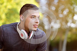 Young latin man runner looking future thinking running jogging sports training fitness workout copyspace copy space