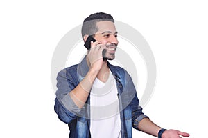 Young latin man talking on his phone.